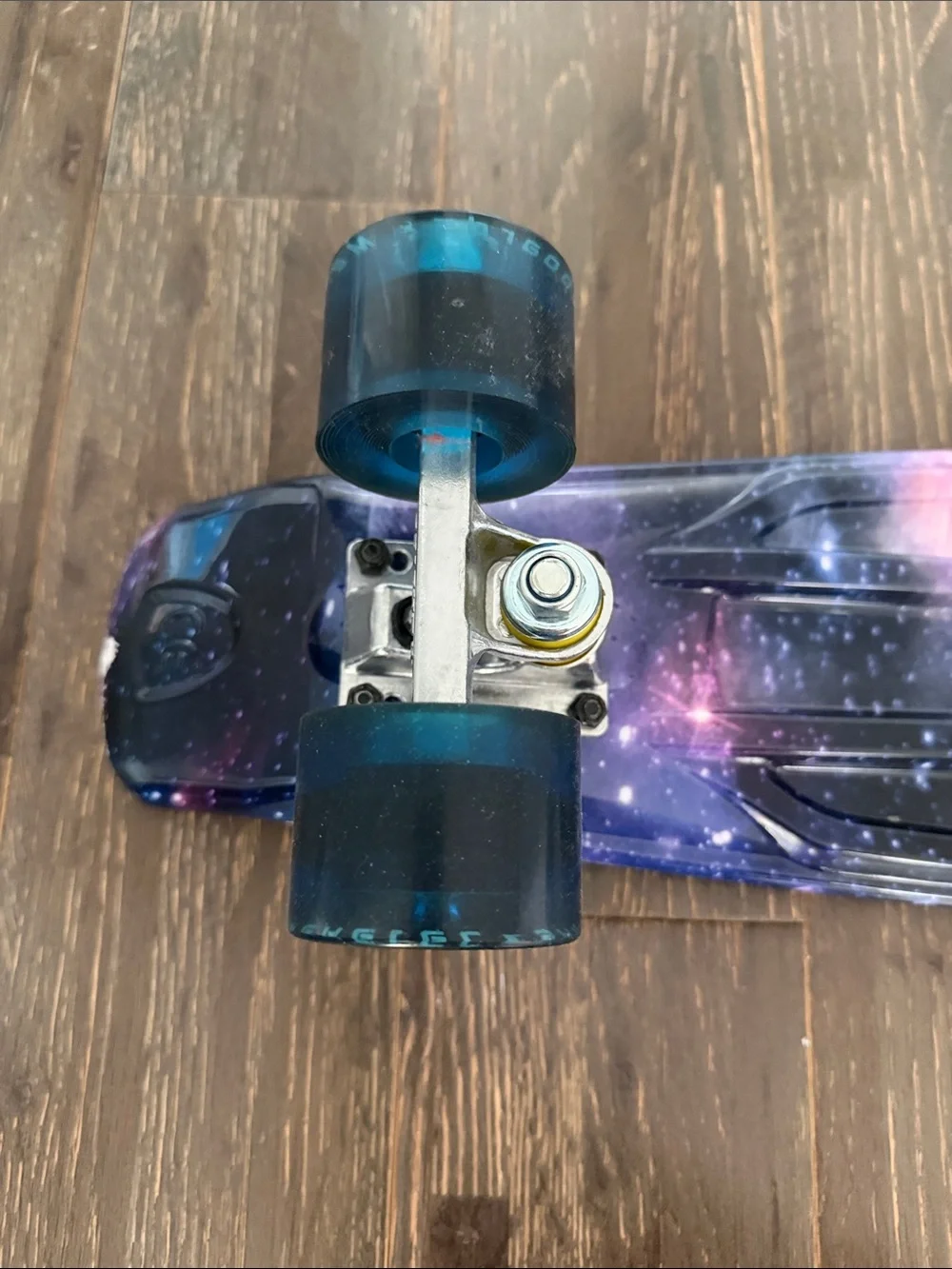Galaxy Print Skateboard Wall Accent in Purple and Pink